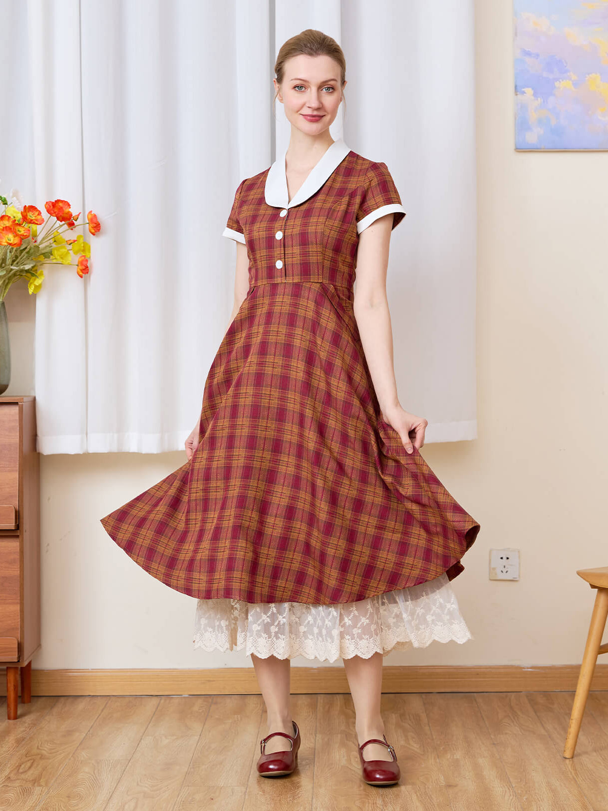 Sueasyretro cream lace skirt extender layered under a plaid midi dress for added length.