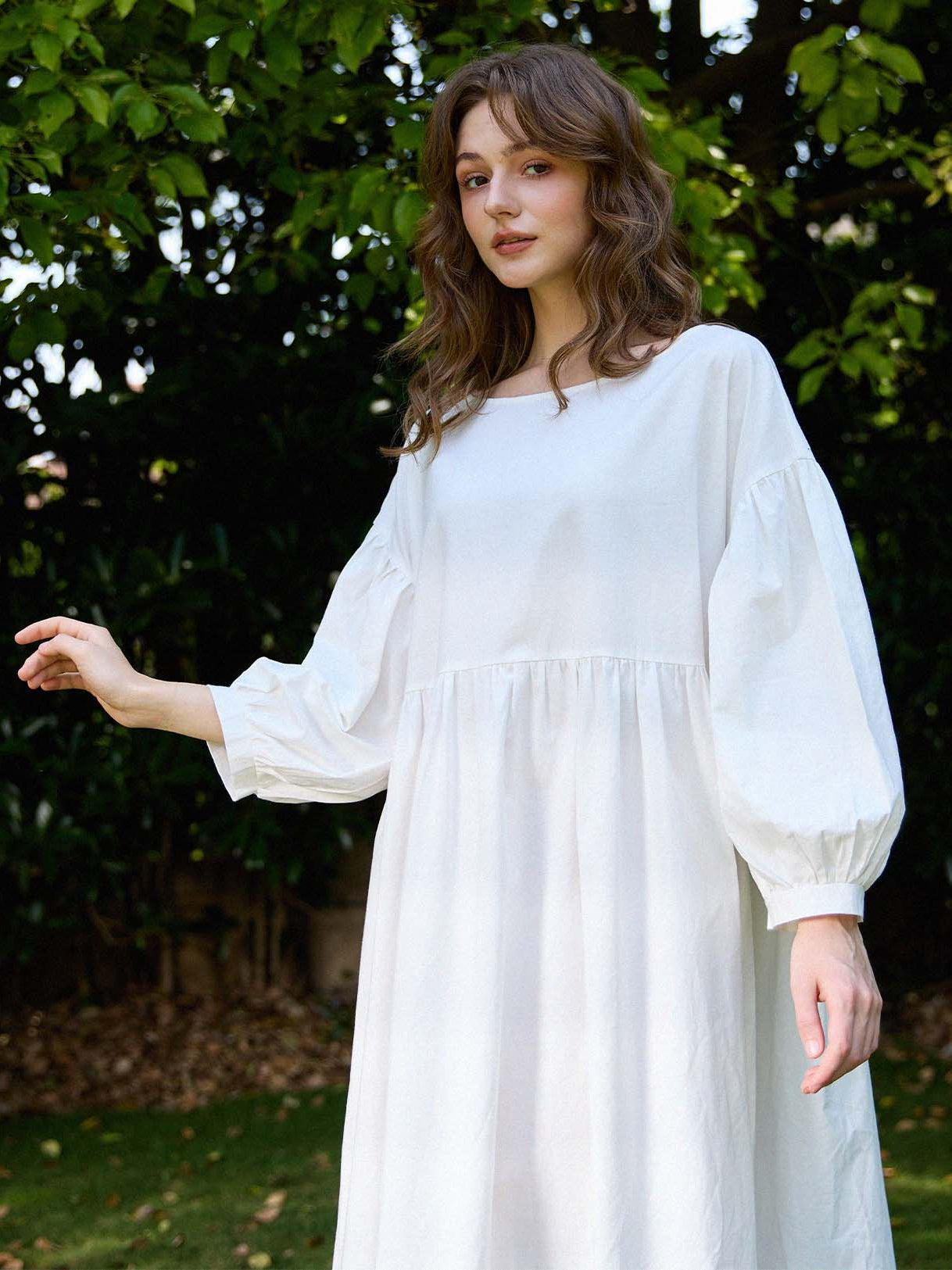 Sueasyretro white cotton house dress: boat neckline, drop-shoulder bishop sleeves, and softly gathered empire waist.