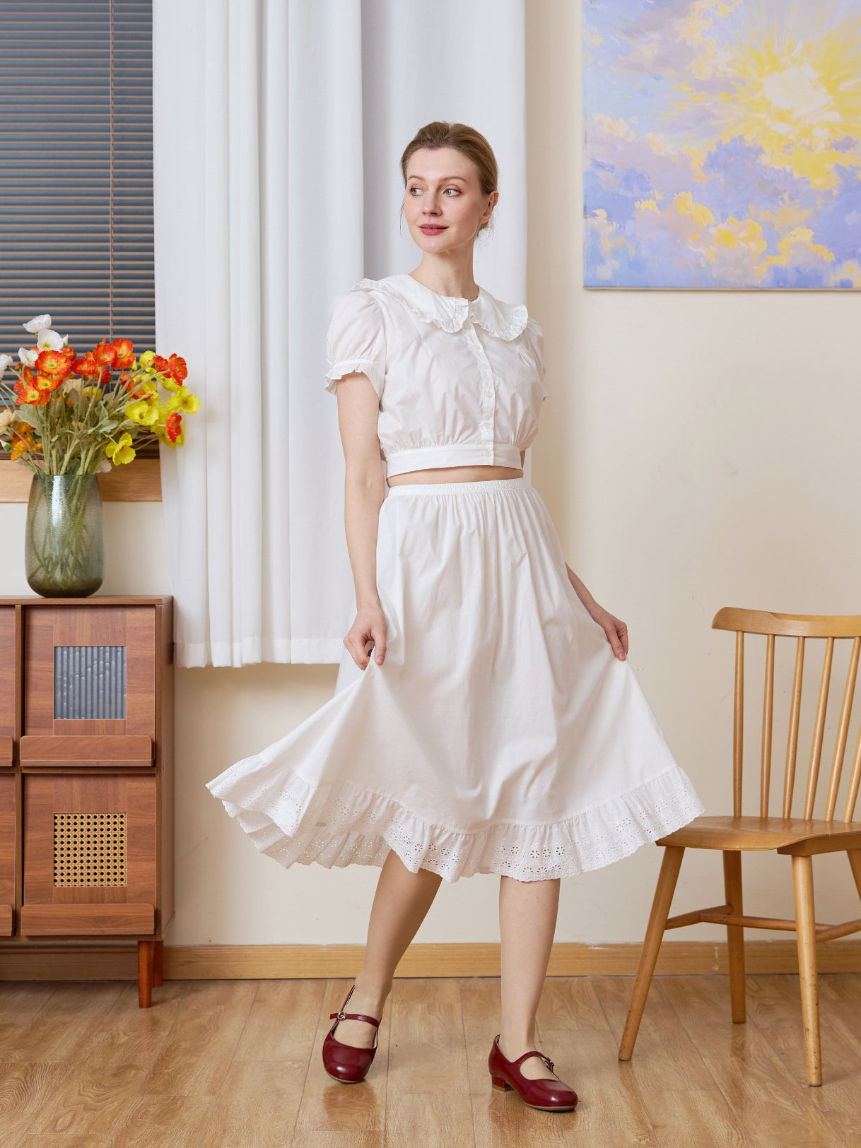 Model twirling in the white half slip. A flowing long half slip and cotton Petticoat perfect for standalone wear.
