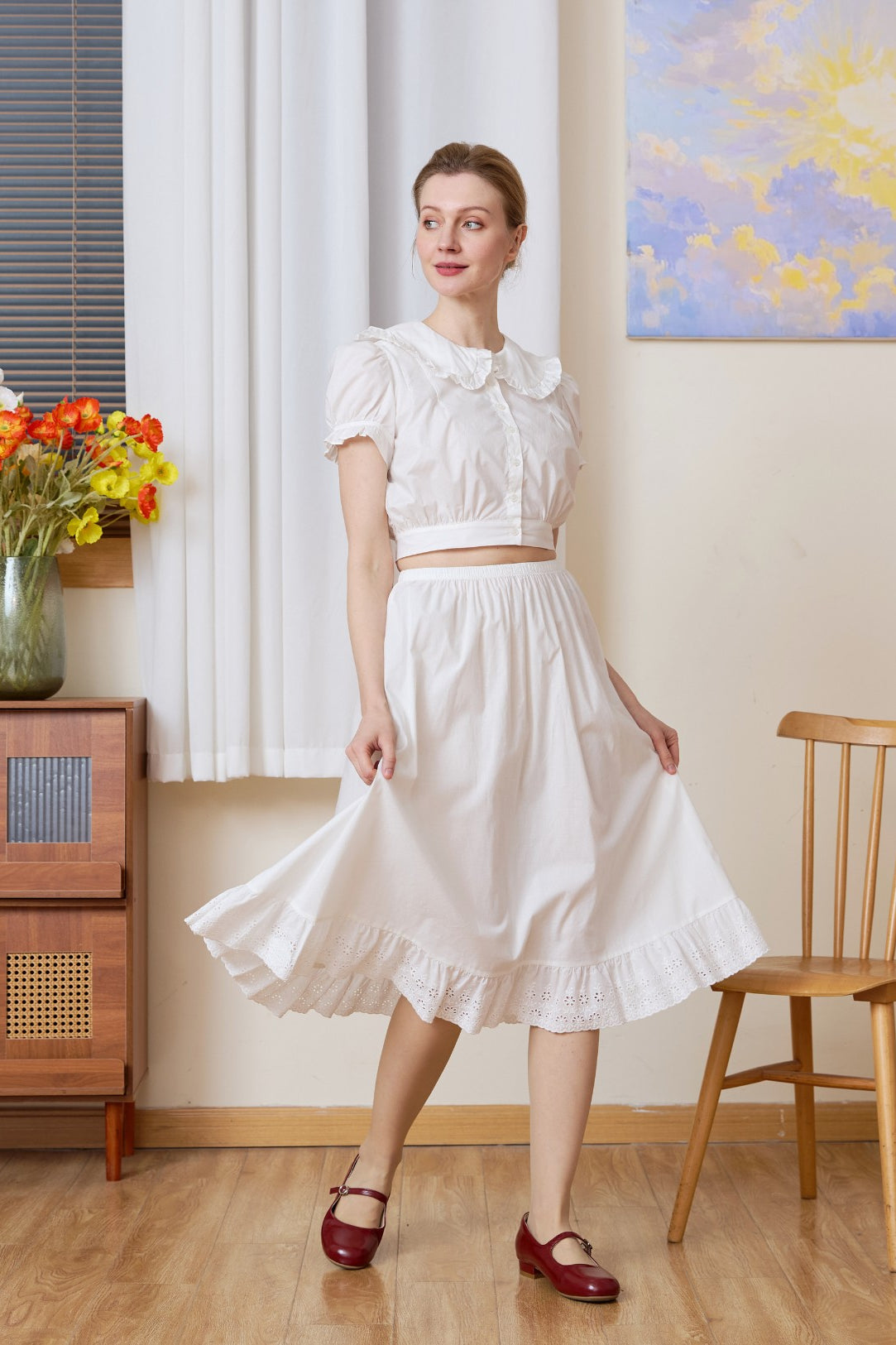 Model twirling in the white half slip. A flowing long half slip and cotton Petticoat perfect for standalone wear.