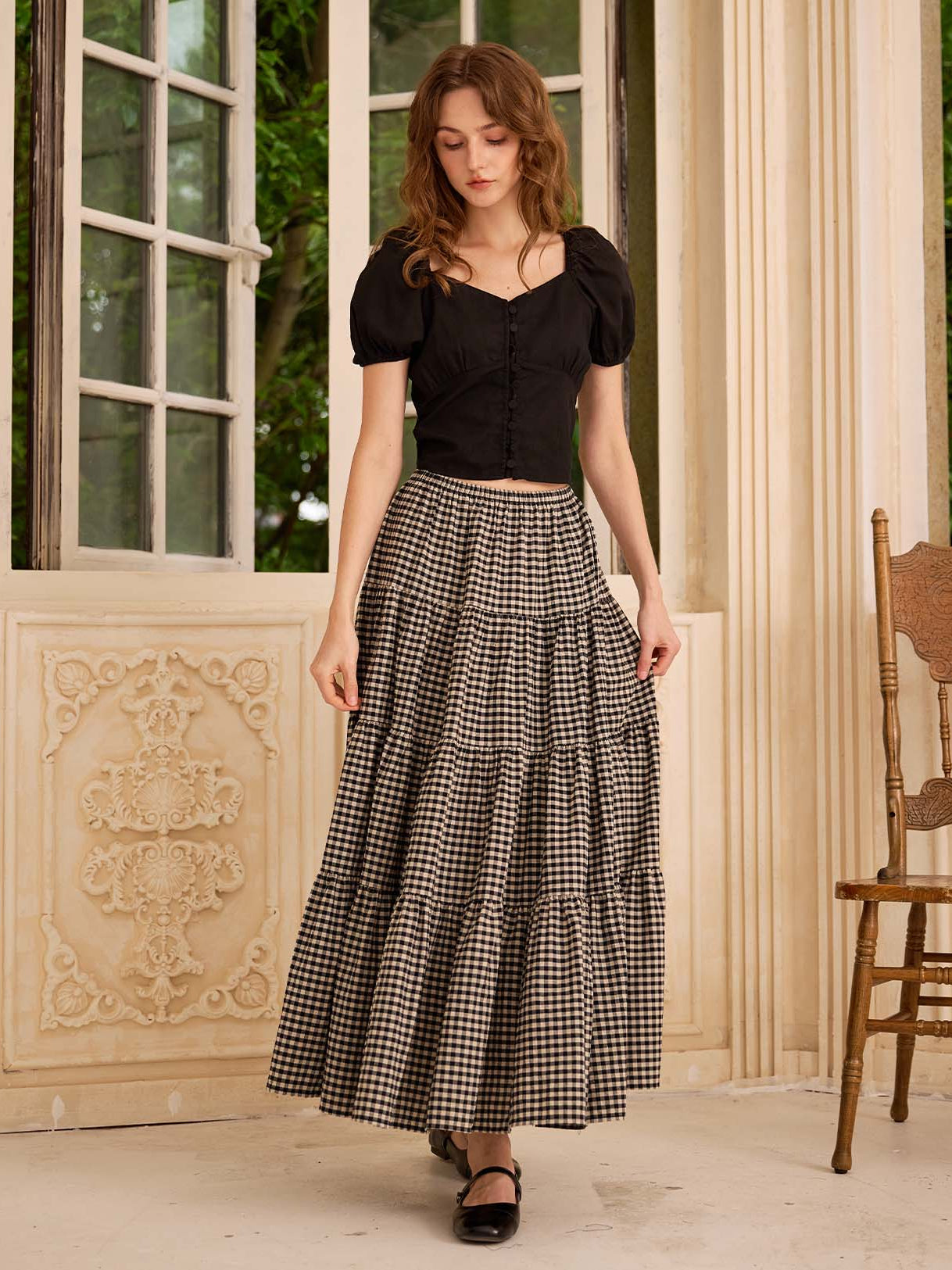 Sueasyretro black plaid cotton long skirt with practical side pockets capturing a bohemian spirit, front view.