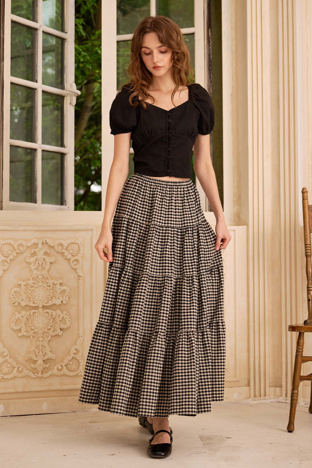 Sueasyretro black plaid cotton long skirt with practical side pockets capturing a bohemian spirit, front view.