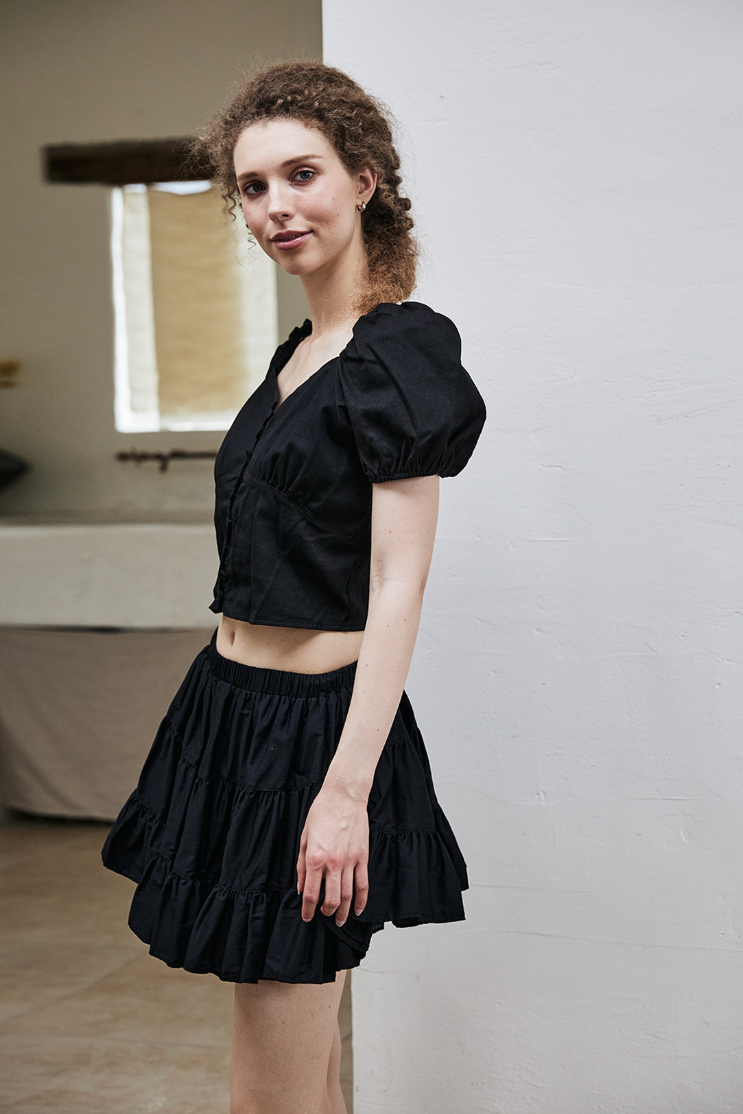 women's vintage cotton tiered skort worn with casual top - side view