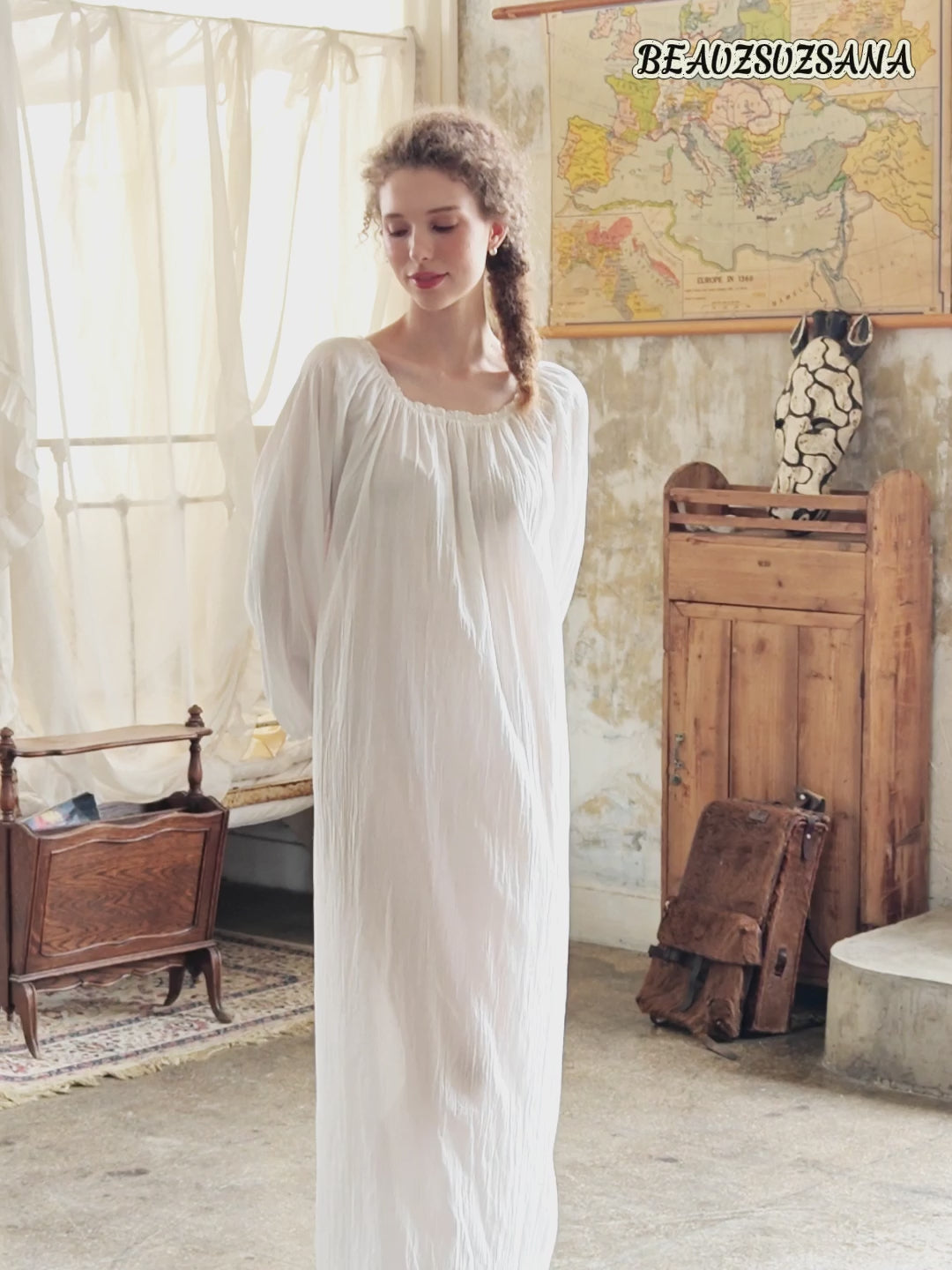 White Victorian nightgown for women with long sleeves and elegant lace trim