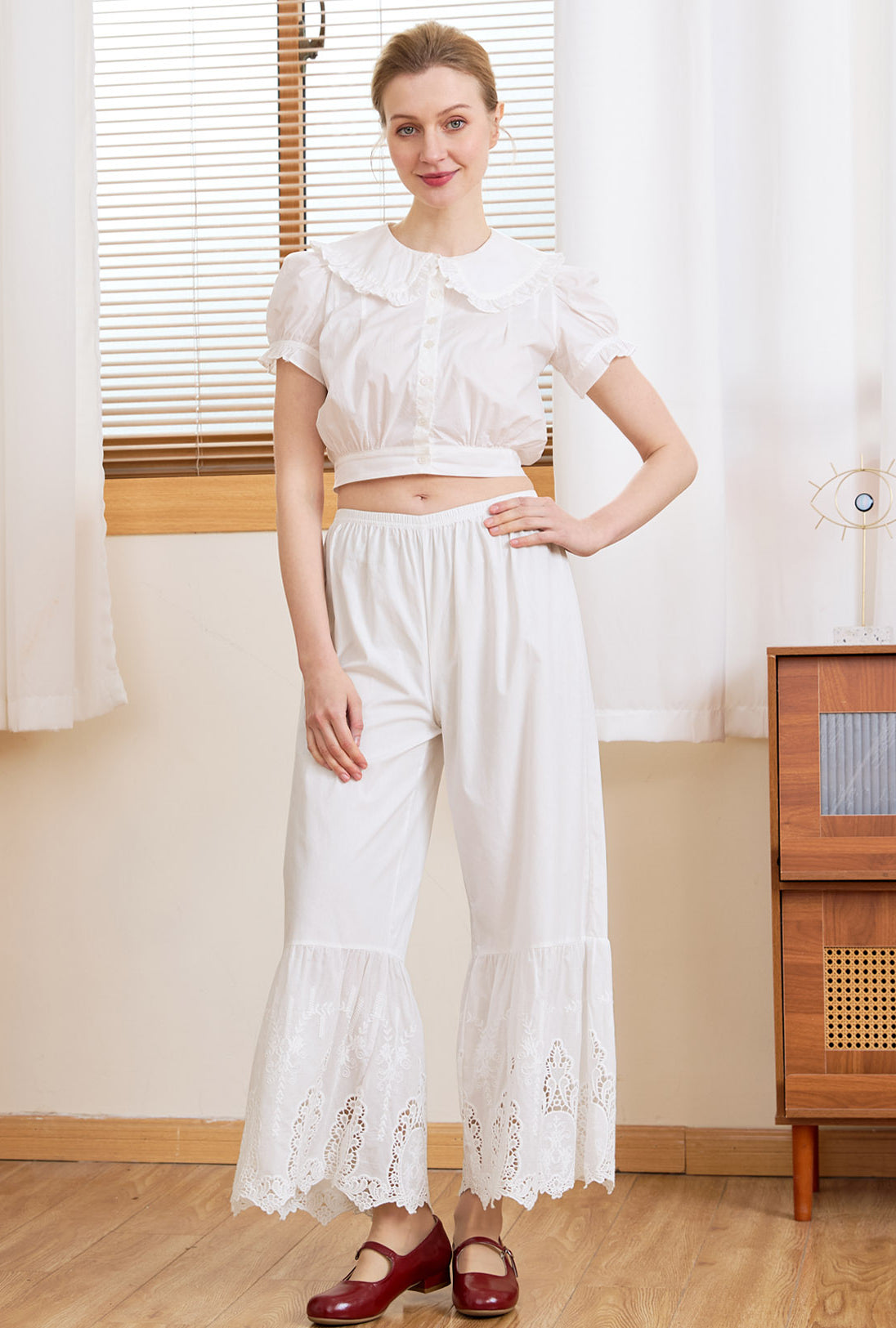 Model wearing Ivory Sueasyretro 100% Cotton Lace Bloomers and red Mary Janes.