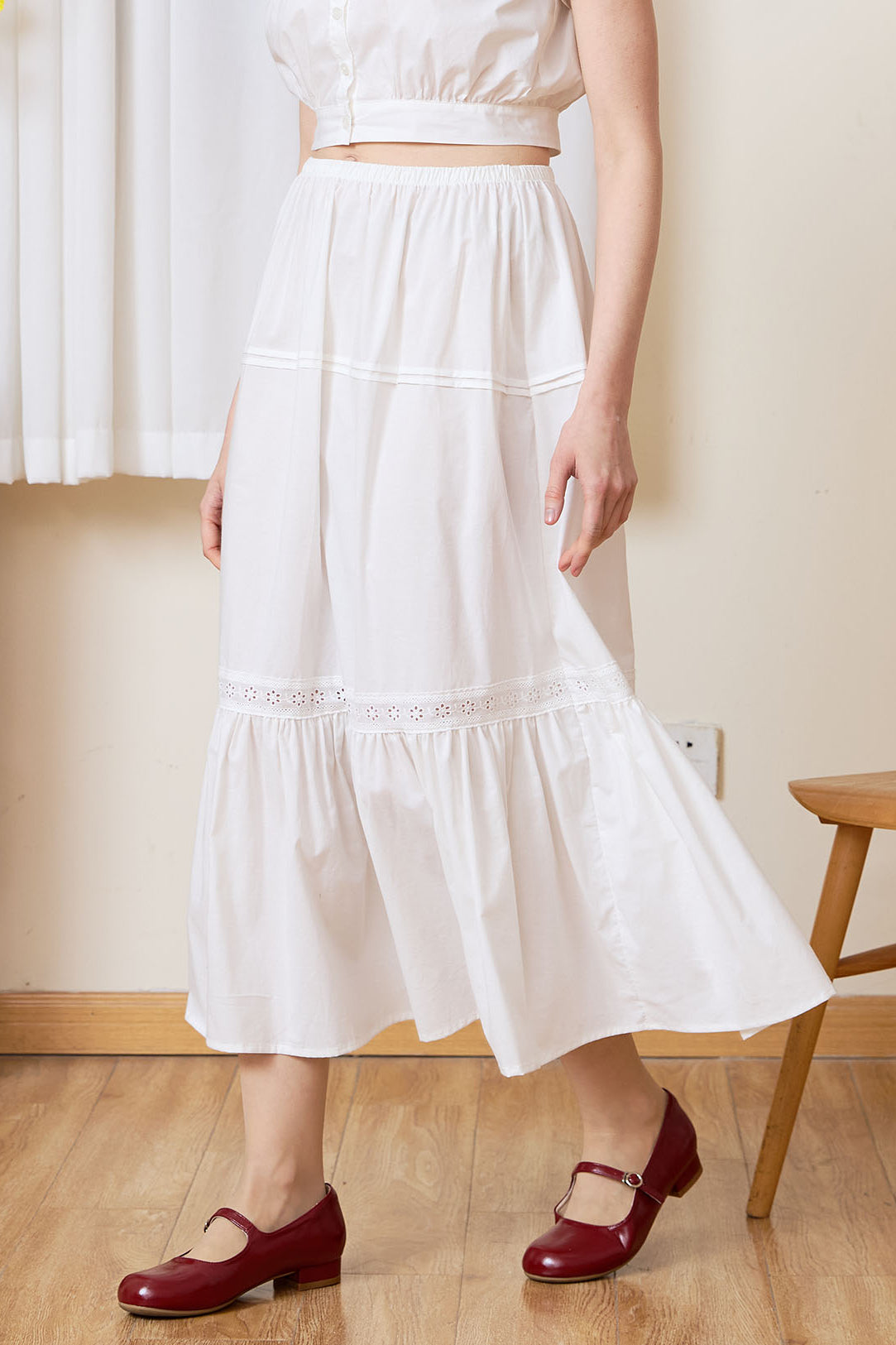 Sueasyretro white 100% cotton midi skirt with ruffle hem, front view.