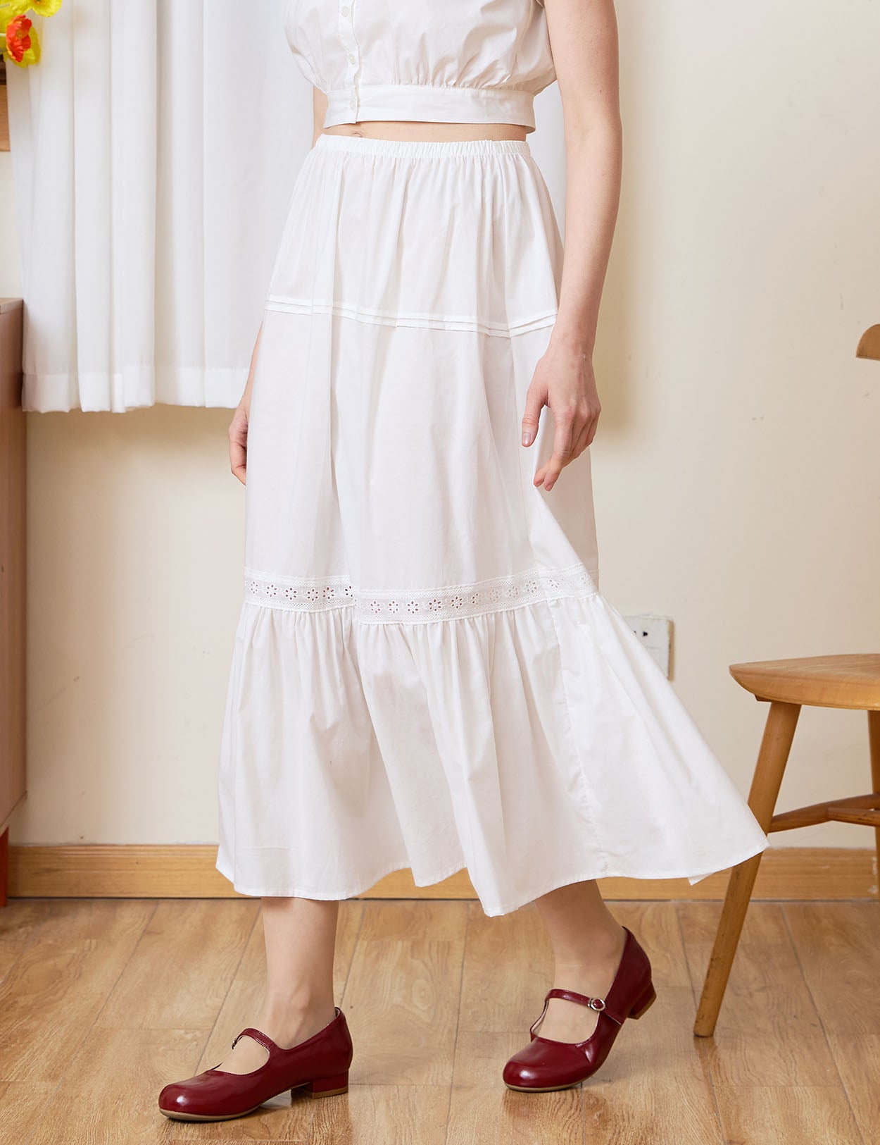 Sueasyretro white 100% cotton midi skirt with ruffle hem, front view.