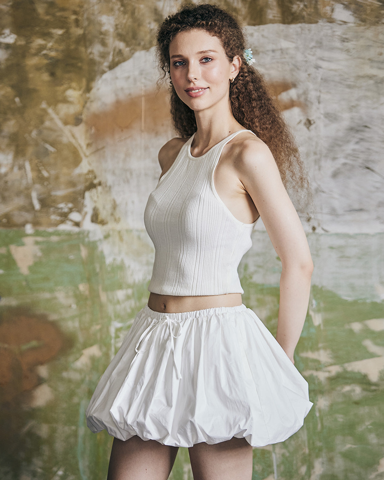 women's white cotton bubble skort showing fabric texture and pleated construction