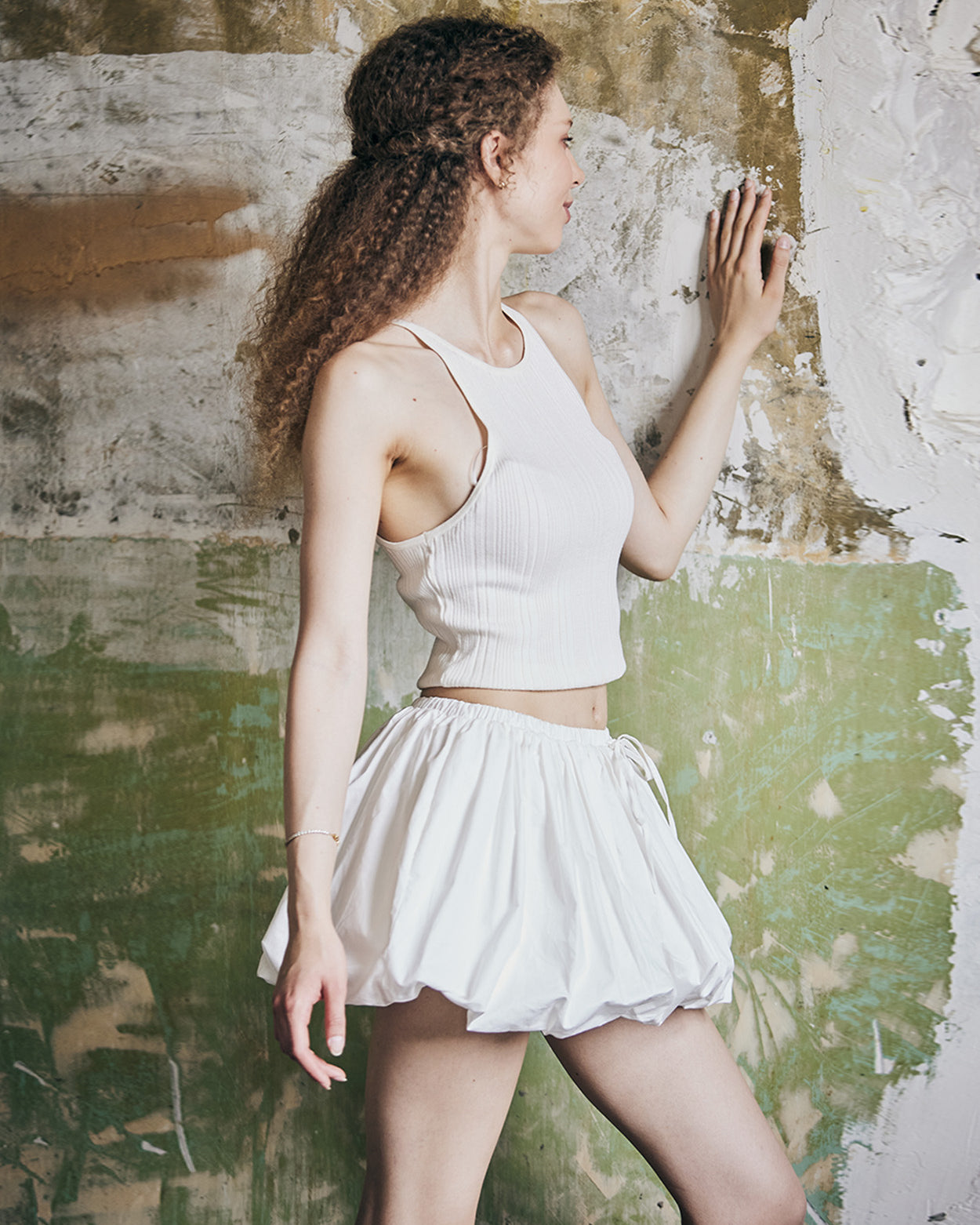 women's white cotton bubble skort showing fabric texture and pleated construction