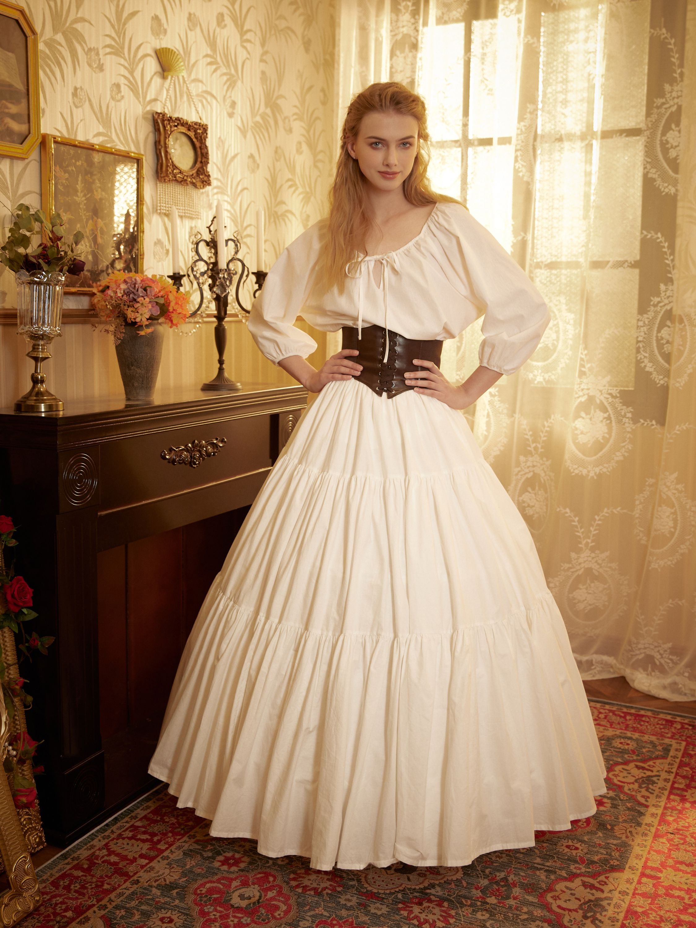 Close-up showing how the 4-hoop cotton underskirt creates a dramatic A-line silhouette and holds the shape of a long white dress.