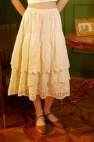 Front view of a 100% cotton petticoat half slip featuring a 3-tier scalloped lace embroidery hem, worn as a vintage-style standalone skirt.