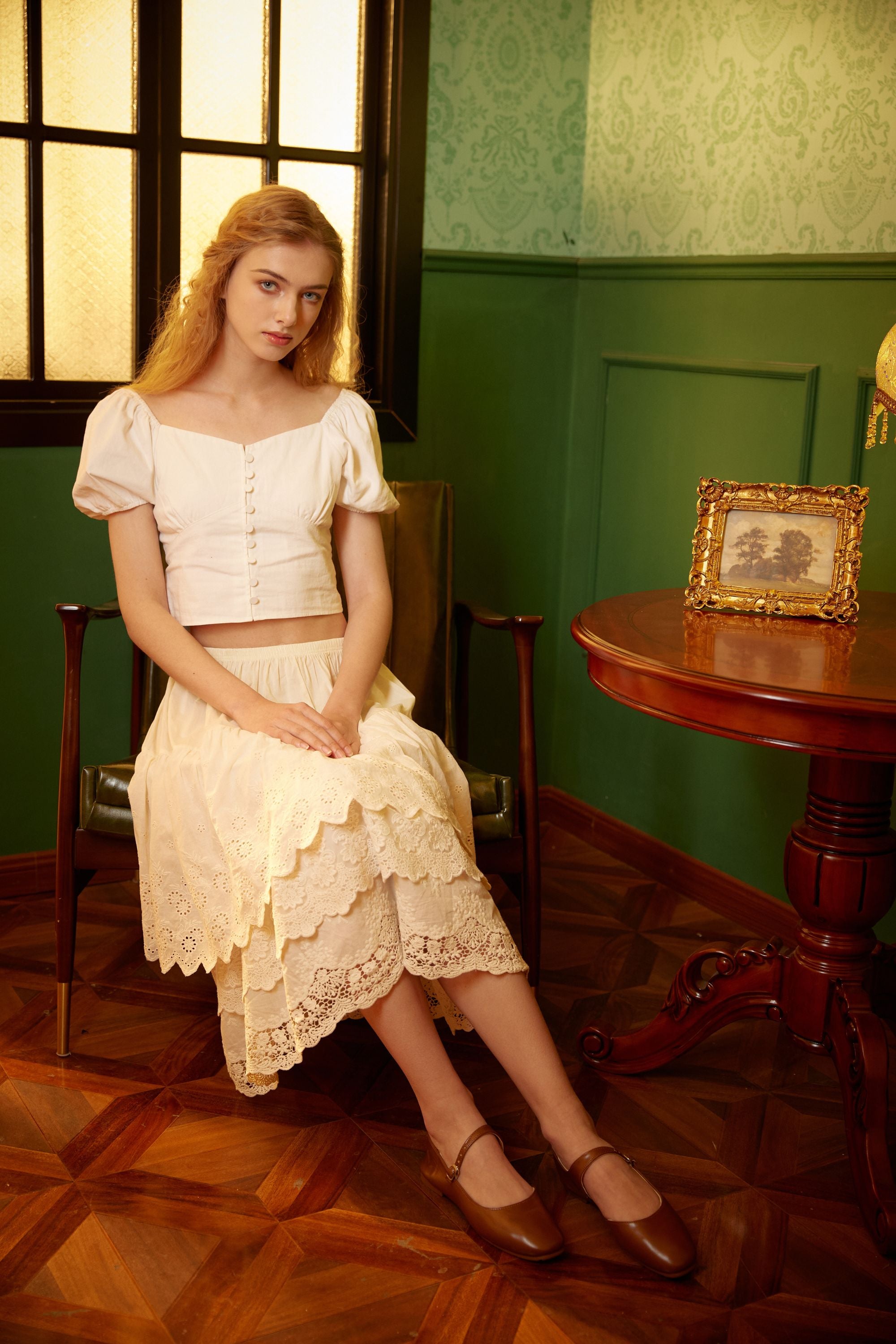 Full length view of a versatile, anti-static cotton half slip with scalloped lace trim, comfortably worn as an everyday skirt in a retro setting.