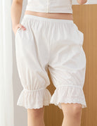 White cotton knee-length bloomers with elasticated ruffled lace cuffs.