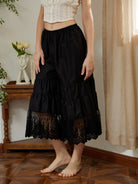 Front view of the black bloomer femme. These women big bloomers offer comfort and feature a beautiful cropped lace edge.
