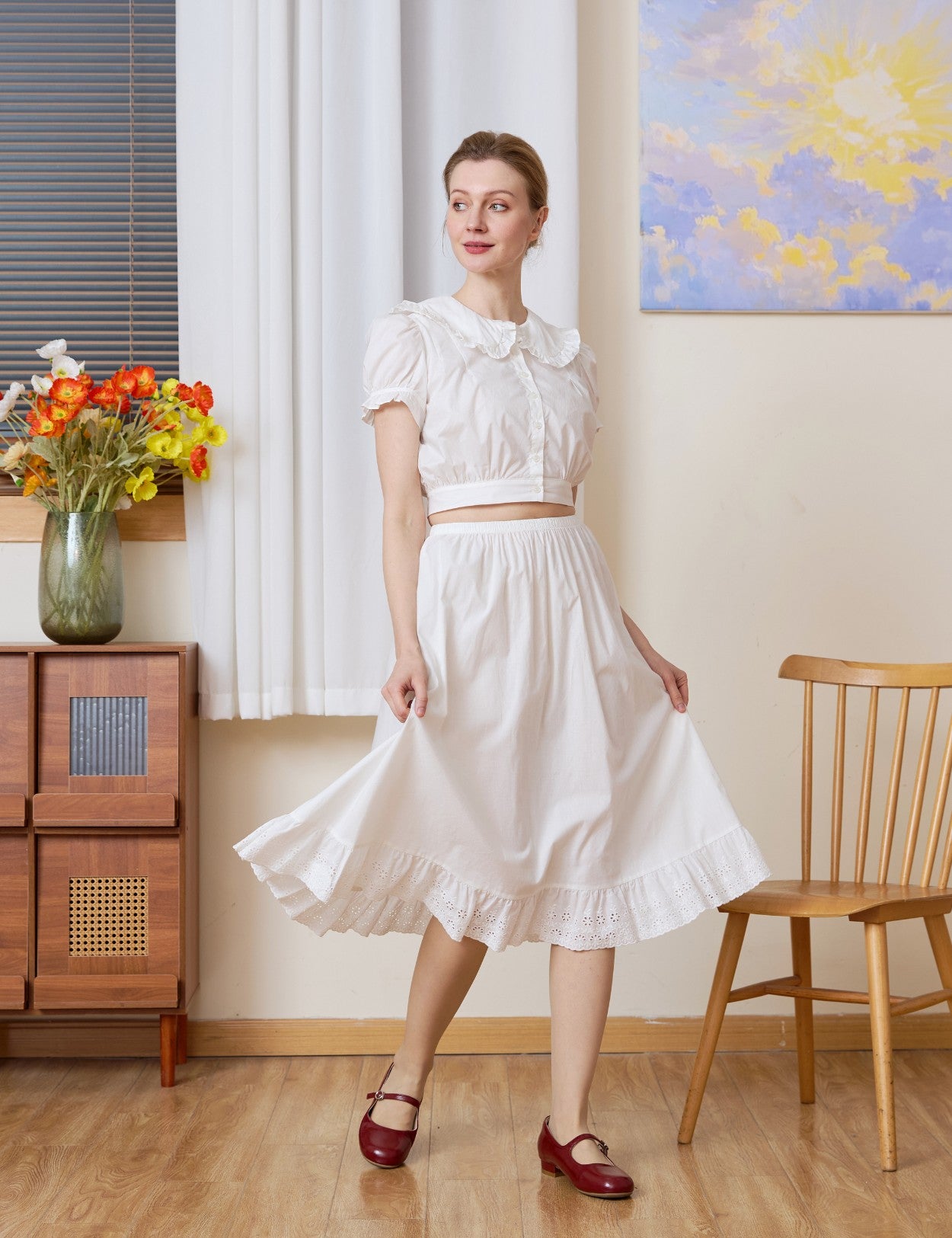 Model twirling in the white half slip. A flowing long half slip and cotton Petticoat perfect for standalone wear.