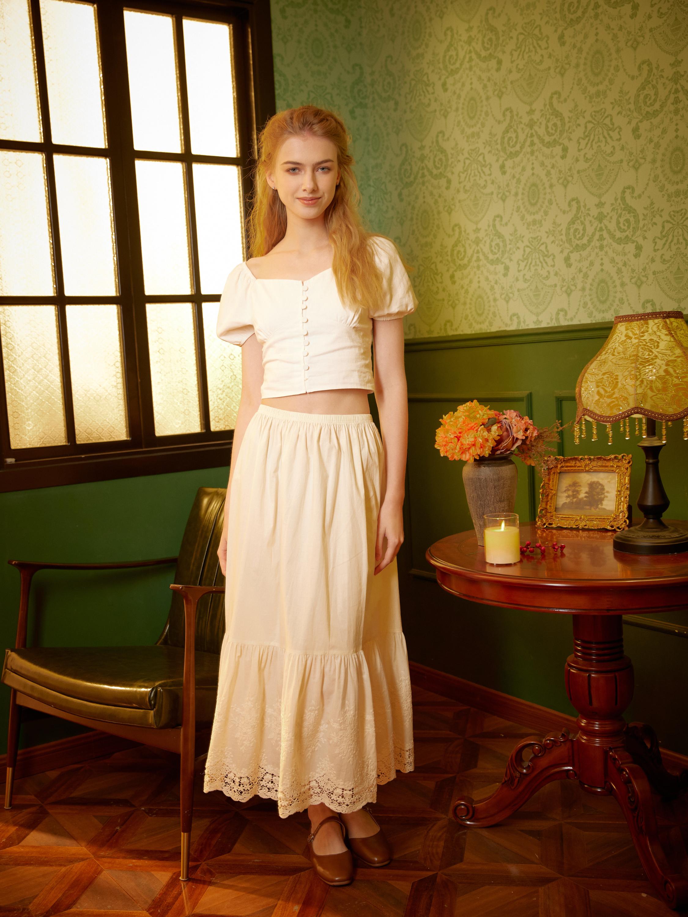 Front standing view of the beautiful midi cotton petticoat lace skirt by Sueasyretro.