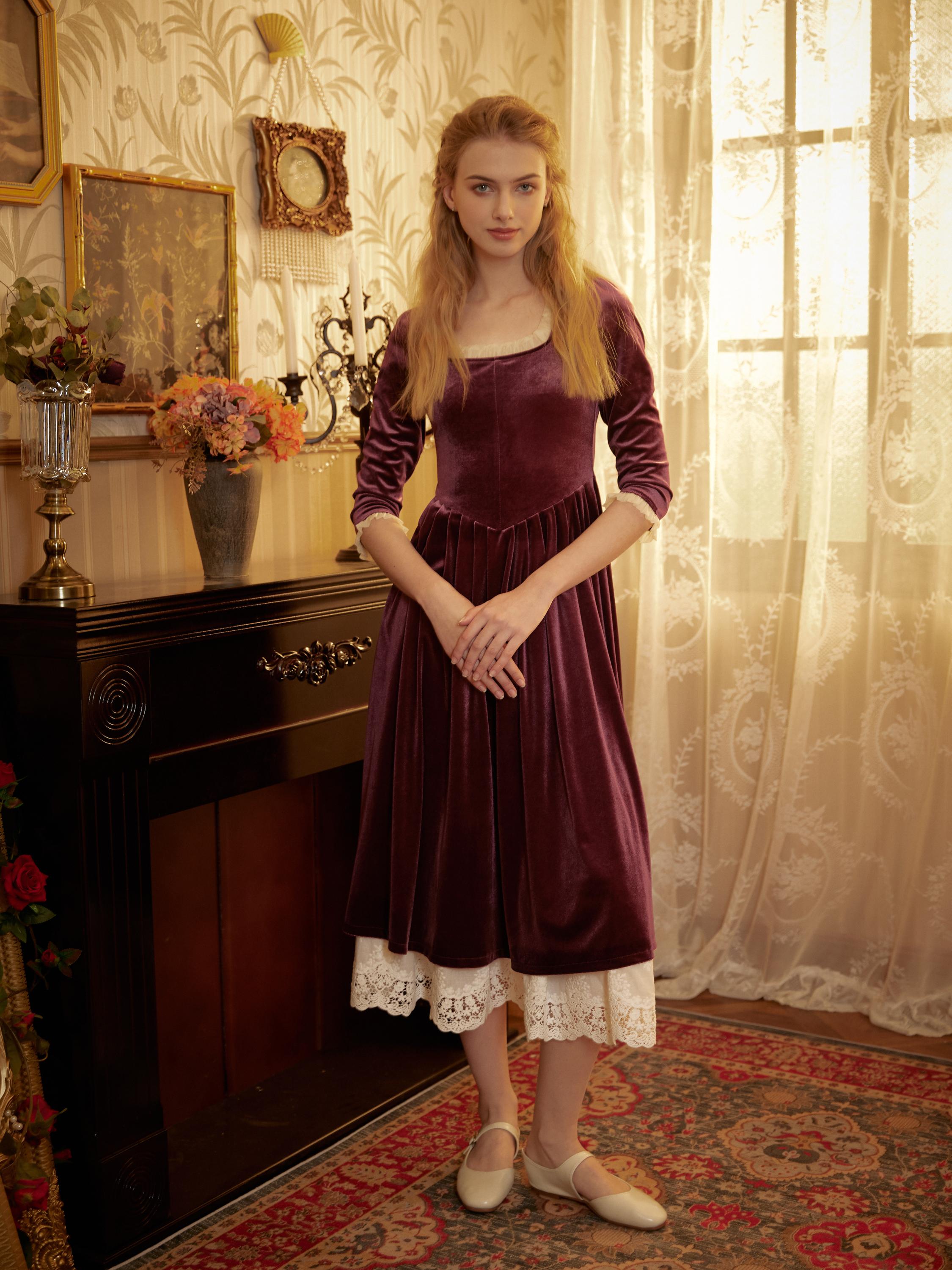 Vintage layering with the ivory midi cotton petticoat lace showing under a purple velvet dress.