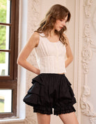 Black cotton bloomers for women. Ruffle bloomer shorts by Sueasyretro with a clean front and elasticated eyelet lace cuffs.