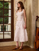 Angled view of white cotton bloomers for women. These tiered bloomer pants offer retro charm and breathable comfort.