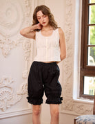 Black cotton bloomers featuring a wide band of eyelet lace. Sueasyretro vintage lace bloomer pants for everyday wear.