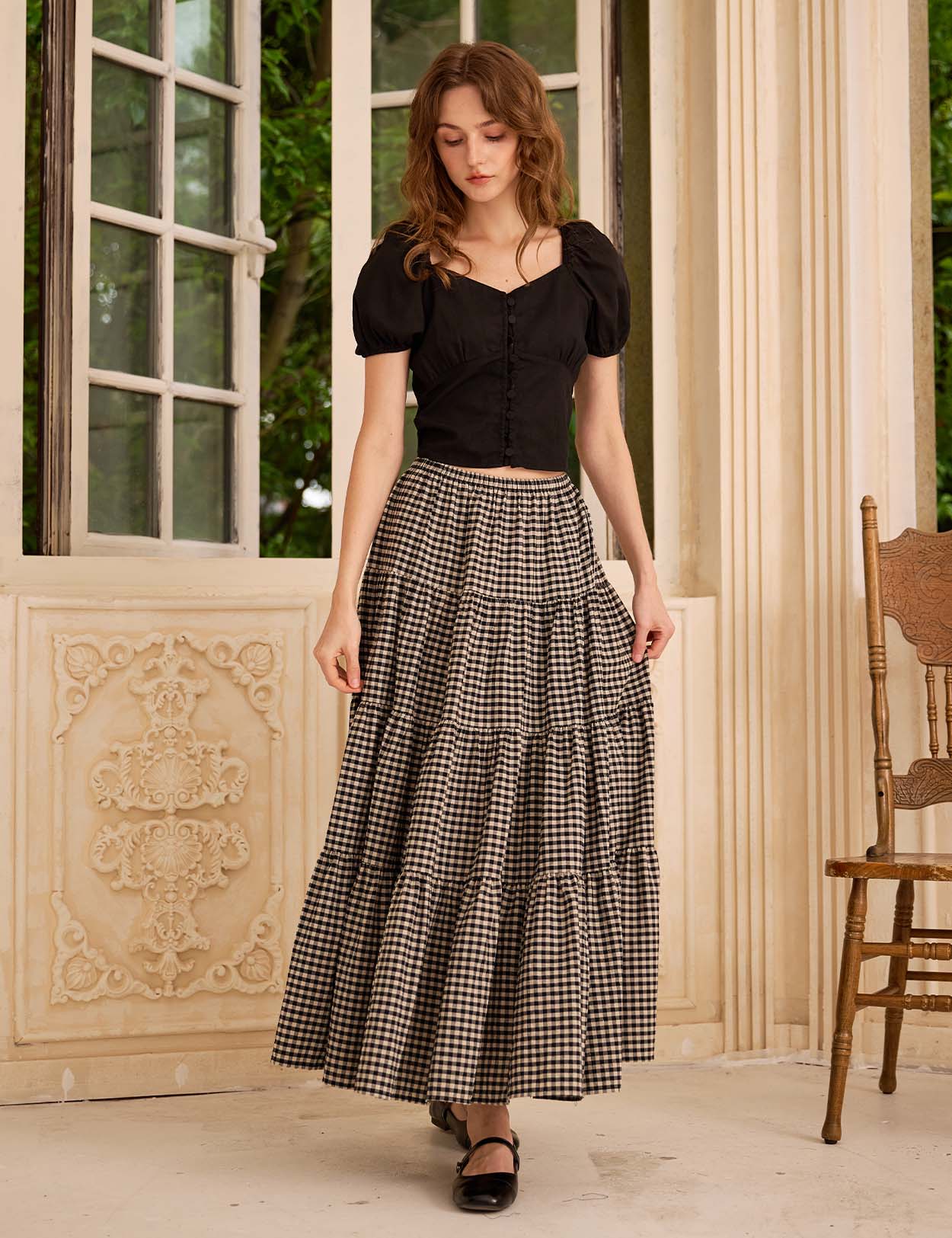 Sueasyretro black plaid cotton long skirt with practical side pockets capturing a bohemian spirit, front view.