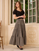 Sueasyretro black plaid cotton long skirt with practical side pockets capturing a bohemian spirit.