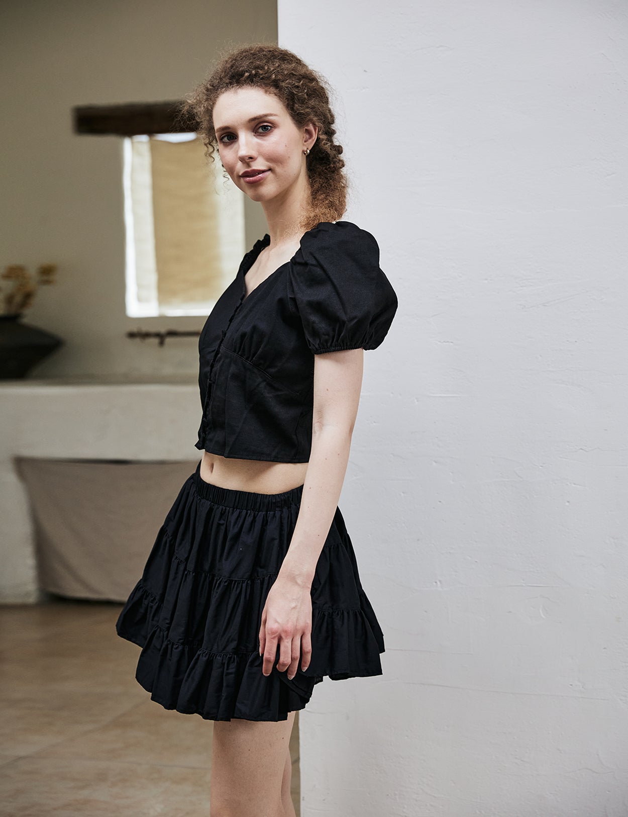 women's vintage cotton tiered skort worn with casual top - side view