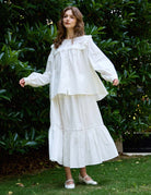 Sueasyretro breathable white cotton ruffle skirt with lace details. Ideal for outdoor rustic vintage aesthetic outfits, side angle.