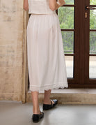 Back view of the Sueasyretro ivory 100% cotton half slip. A breathable midi length petticoat for everyday comfort.