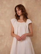 Sueasyretro ivory Victorian nightgown. Close-up of sleeveless cotton modest nightie featuring exquisite eyelet lace trim.
