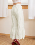 Back view of cream vintage 100% cotton lace bloomers by Sueasyretro featuring wide-leg hems.