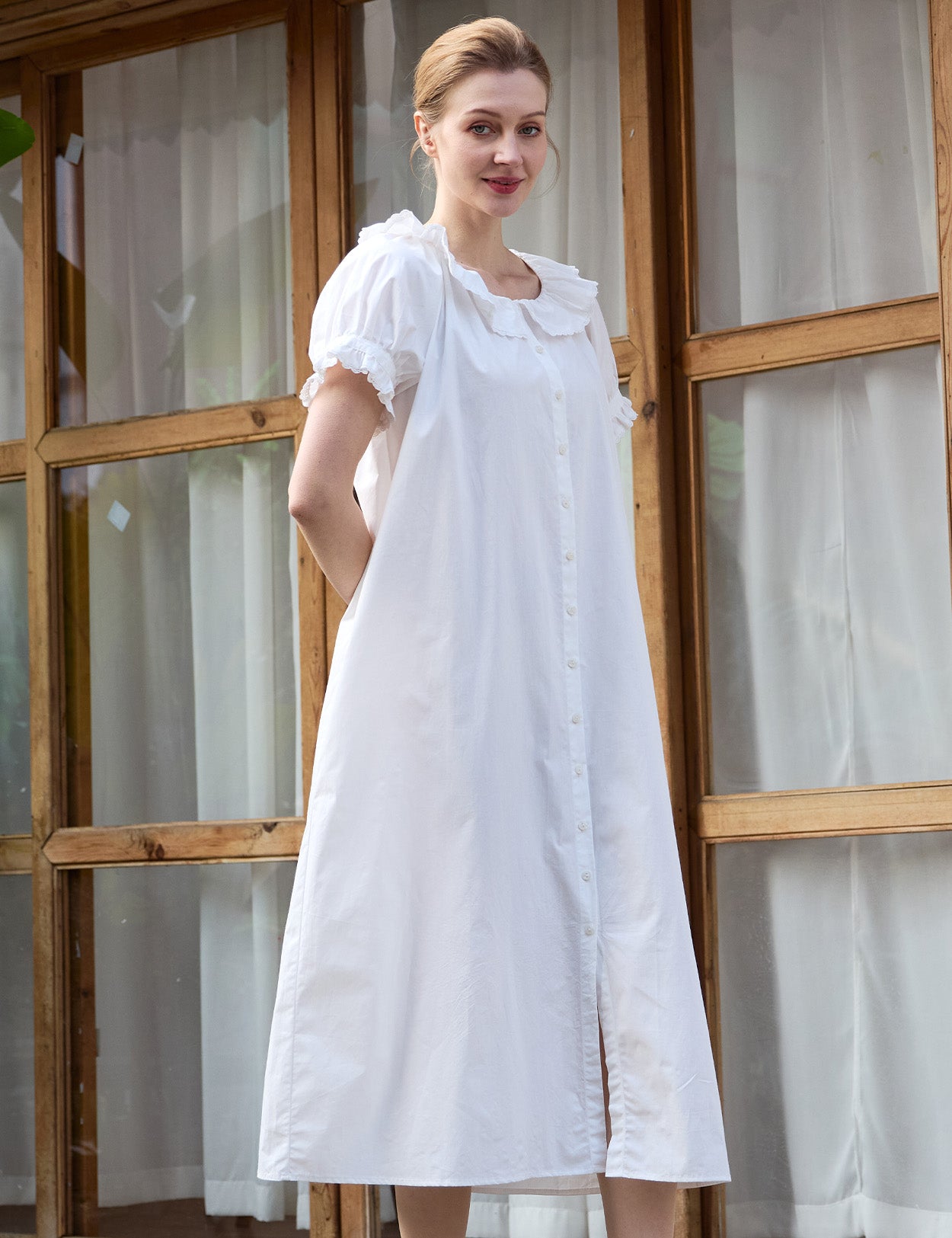 Puff sleeves on Sueasyretro old fashioned cotton house dresses in white.
