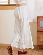 Back view of Ivory Sueasyretro vintage bloomer pants with elastic waist and delicate lace detail.