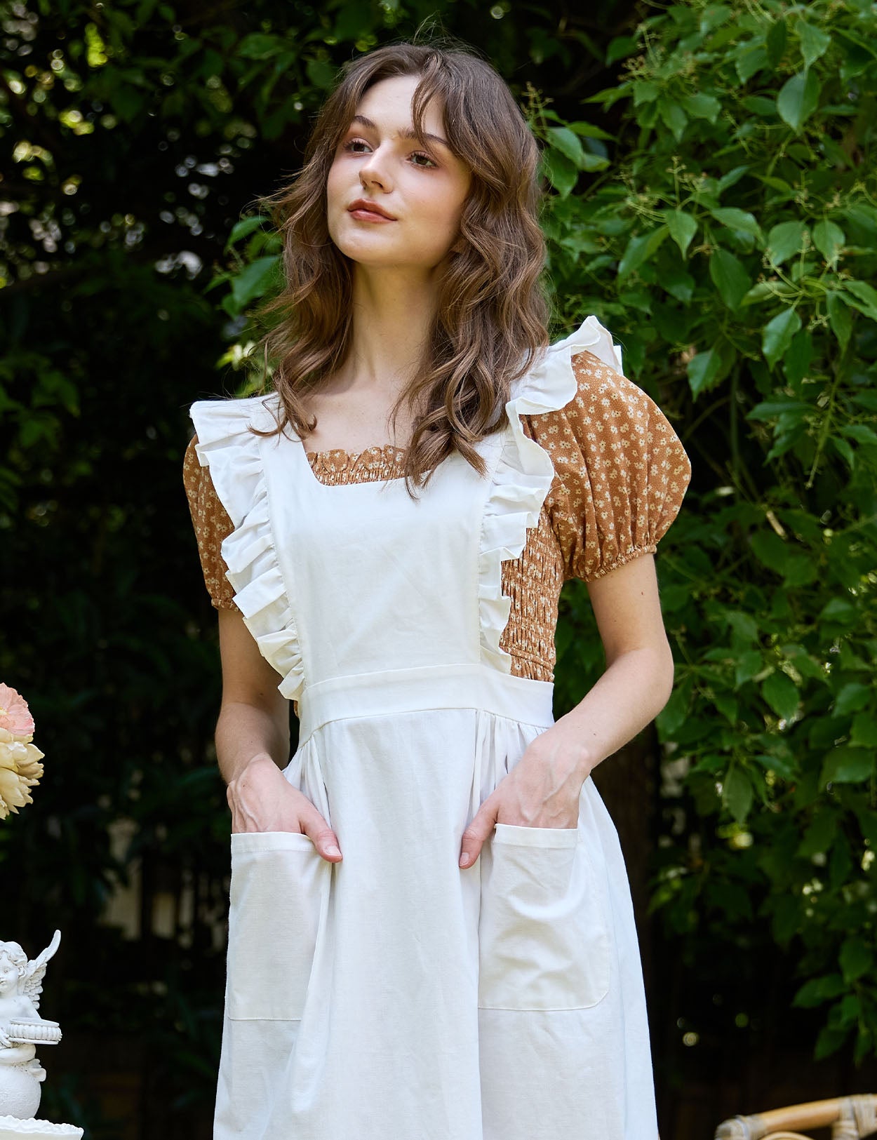 Victorian cotton pinafore apron for women with ruffle trim and front pockets, ivory