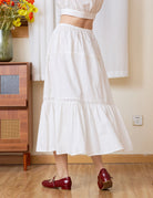Sueasyretro white 100% cotton midi skirt with ruffle hem and eyelet lace, back view.