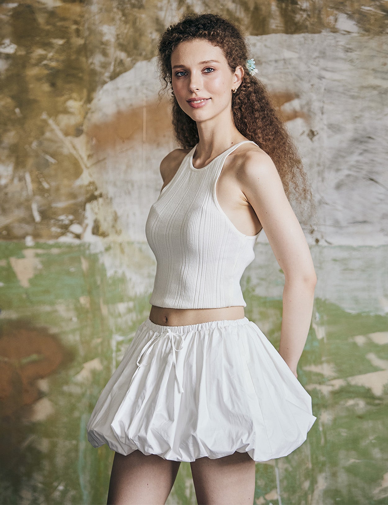 women's white cotton bubble skort showing fabric texture and pleated construction