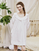 Oversized Victorian dress for women made of 100% cotton, featuring a loose Renaissance peasant silhouette and ruffle neck.