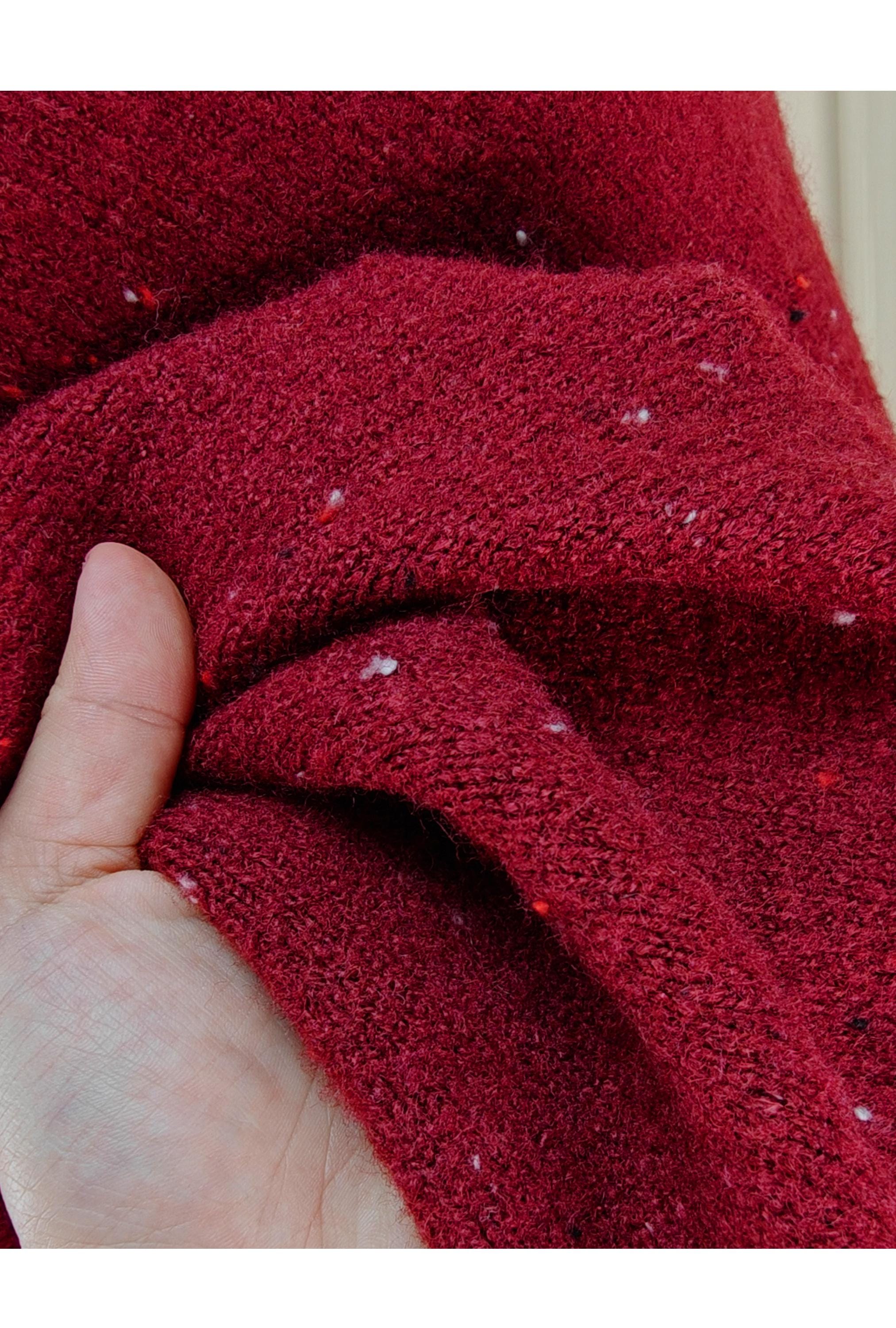 Women's knit wool poncho in tweed speckled pattern fabric details